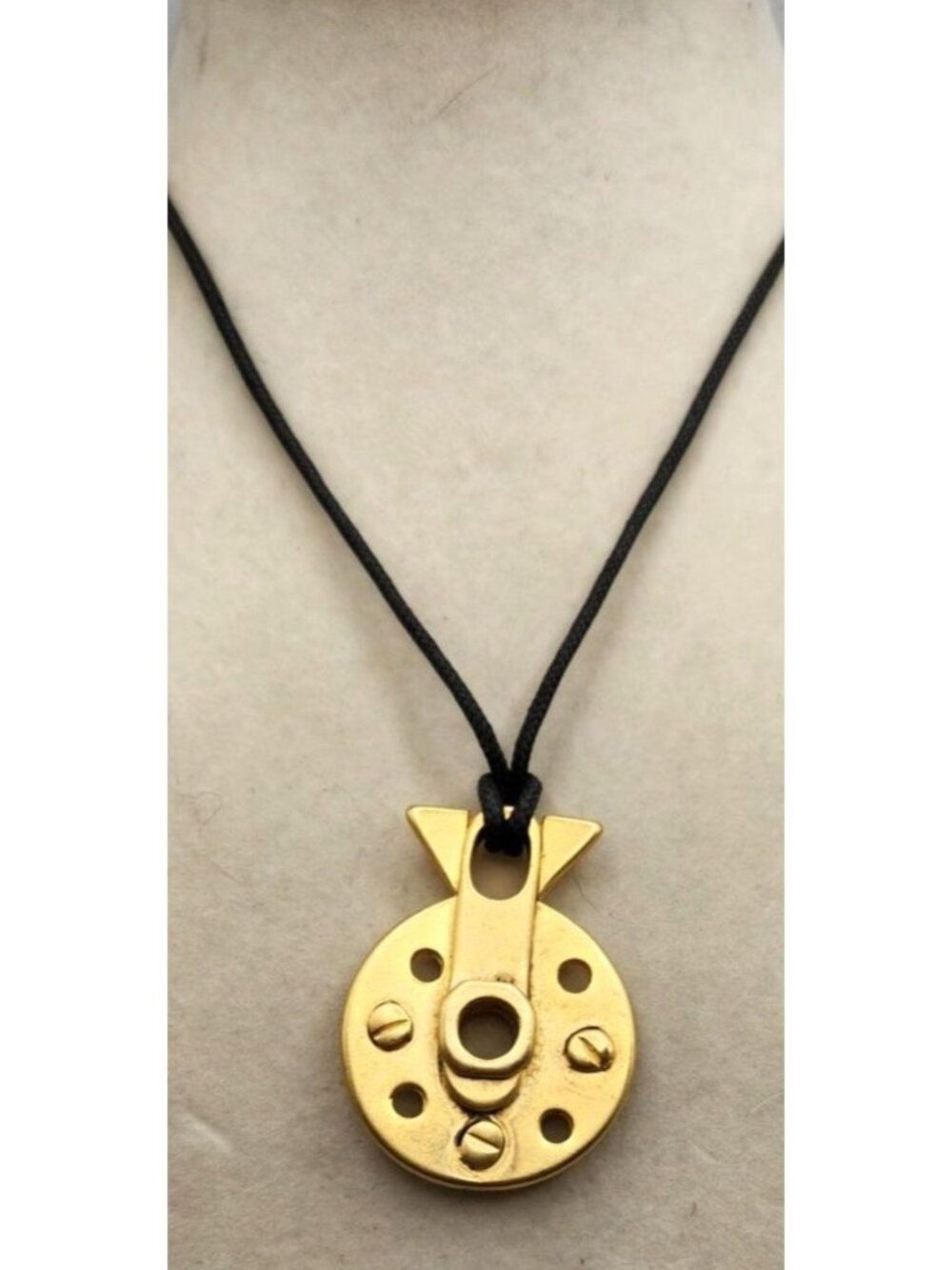 Industrial-Inspired Gold Tone Metal Pendant With Black Cord